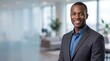© ArtStockVault - Confident African American Businessman Smiling in Modern Office