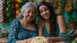 © Maksym - A Puerto Rican grandmother and her adult daughter making sofrito together in a cramped but vibrant apartment kitchen, hanging peppers, dried herbs, mortar and pestle on a tile counter, perfect for c