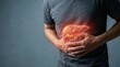 © Eggie - Person experiencing liver pain or disease, with a glowing illustration of the liver superimposed on their abdomen.