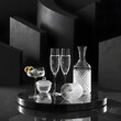 © Abubakar - A still life scene with a glass of cognac and a perfume bottle on a table creating a calm and elegant atmosphere