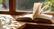 © SashaMagic - Open Bible on a sunlit windowsill with pages gently turning, evoking spiritual reflection and peaceful contemplation