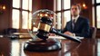 © Watcharapong - A gavel rests on a podium with a digital globe in the background, symbolizing law and technology in a courtroom setting.