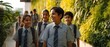 © Yulia - Diverse group of happy school children in uniform with backpacks walking on modern green campus