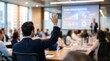 © haemye - Diverse business team in a meeting room, with one man raising his hand to ask a question. Concept for strategic planning, collaborative environment and corporate workshop
