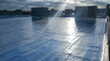 © newlifestock - Roof surface with reflective waterproof coating shining under sunlight on cloudy day, Energy Efficiency Engineering