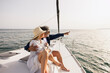 © Jordi Salas - Senior couple sailing enjoying ocean view on yacht vacation