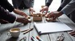 © Christine - Business professionals collaborating to assemble wooden puzzle blocks on a rustic table, symbolizing strategic teamwork.