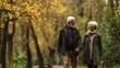 © Sussa Mgt - Elderly couple holding hands while walking in a park during autumn