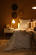© Pixel-Shot - Interior of bedroom with glowing lamp on table at night