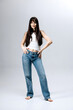 © wedmoments.stock - Beautiful woman in casual fashion look posing on isolated background. Concept contemporary fashion and self expression.