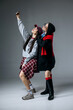 © wedmoments.stock - Two young stylish women making selfie with phone on isolated background. Concept social media content, youth culture and interaction.