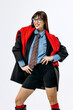 © wedmoments.stock - Modern fashion model posing in creative outfit with minimalist studio composition. Concept bold style and contemporary trends.