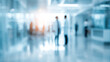 © Subin - Blurred image of professionals collaborating in a modern office environment, illustrating teamwork and innovation.