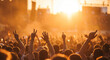 © gie - crowd of people partying at an outdoor music festival during a golden sunset