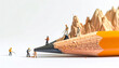 © Slai - Miniature figures working on pencil tip representing creativity and construction