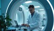 © miss irine - Technician in lab coat uses laptop near MRI scanner. Man checks medical equipment, works on advanced diagnostic machine. Healthcare tech repairs diagnostic system in hospital.