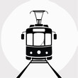 © Eva - black silhouette of a vintage tram on train tracks