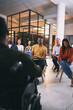 © peopleimages.com - Business, man and presentation with team in office for training, press workshop and media coverage. Staff, listening or speaker with wheelchair, coaching employees and journalist briefing for project
