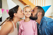 © peopleimages.com - Kiss, parents and child with portrait for birthday party, affection and celebration event for growth. Happy family, people and girl with love for special day, development milestone or support in home