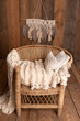 © Наталія Павлова - Boho style. Wicker chair. Backdrop for a newborn photo shoot. Beige tones. Natural style.