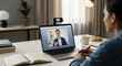 © hanip - Online meeting with a smiling man on a laptop screen