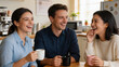 © Ricky - Three diverse corporate colleagues laughing and talking together over coffee in a bright office breakroom, enjoying a natural candid moment of friendship and team bonding during a work break.