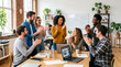 © Bohdan - Creative Team Celebrating Office Success