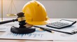 © swadhin - Construction law concept with judge gavel and yellow hard hat. Labor regulations and building safety legislation. Industrial legal services and workplace justice.