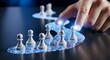 © mikael - Leadership and guidance concept. A leader's hand guides a small group of pawns (game figures) along a holographic path of light.