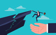 © wei wan - Business support and help in adversity. A hand to protect a businessman hanging on the edge of a cracked cliff