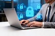 © fa - Businessman working on laptop with digital security icons