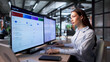 © Andrey Popov - Woman Using Computer To Review Financial Audit Logs