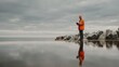 © Shahamand - Worker Surveys Coal Mine Landscape Under Stormy Skies.And sea