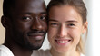 © photo for everything - Headshot of happy diverse couple embracing, look at camera. Multiethnic man and woman cuddle, show love and unity. Mixed race pair smile warmly close up