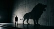 © Ghulam - Businessman stands facing a large shadow of a roaring lion cast upon a textured concrete wall to represent personal bravery and the hidden wild nature of an ambitious professional worker indoors.