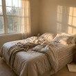 © JahidulGrowthLab - Cozy unmade bed in a sunlit bedroom with soft morning light