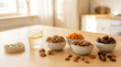 © image studio - Healthy eating concept with a variety of nutritious dried fruits and nuts in bowls a glass of water with lemon and a measuring tape on a wooden table bathed in soft natural light