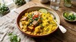 © ArtShop - Colorful vegetable curry with rice and lime on rustic wooden table
