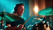 © svastix - A talented drummer intensely focuses as he performs live in a studio, with expressive movements and vibrant lighting enhancing the energetic atmosphere of the music.