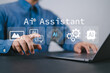 © Nirusmee - Person using AI assistant interface on laptop, representing artificial intelligence in daily life, smart technology, virtual assistance, and productivity enhancement tools.
