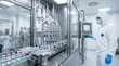 © Maryia - Automated sterile filling machine dispenses clear liquid into glass vials, showing pharmaceutical production, cleanroom workflow and contamination control.