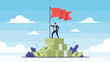 © Rimi - Successful entrepreneur planting flag on high stack of money bills representing financial conquest and achievement.