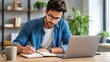 © Andrii  - Young Man Studying and Writing Notes While Working on Laptop