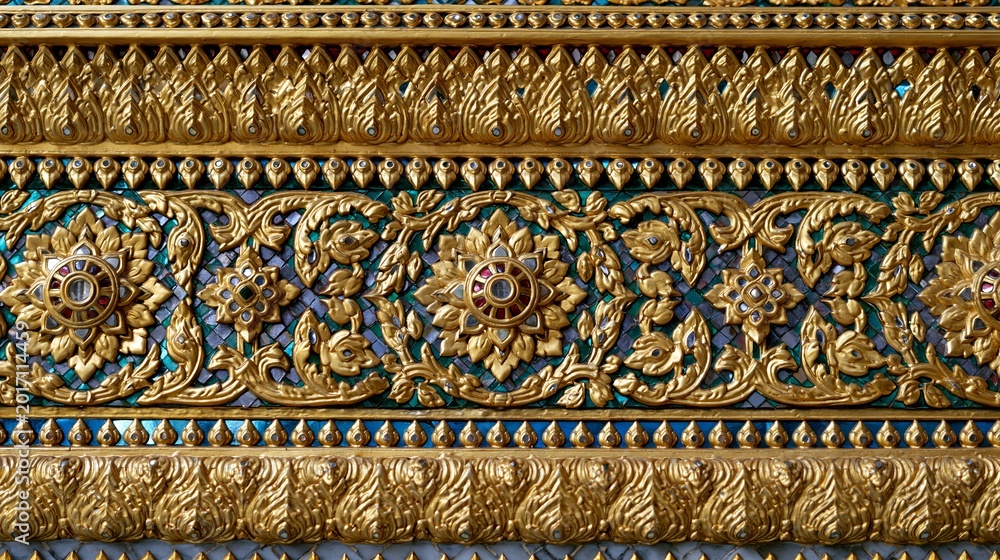 Gold and mosaic artwork on a fancy temple wall at Grand Palace Bangkok ...