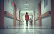 © vectorizer88 - Woman walking alone in empty hospital corridor with reflective floor