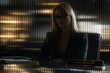 © DimaSabaka - Serious Female Chief of Staff Sitting at Desk Behind Ribbed Glass Partition