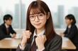 © nori-nori - モダンな会議室で拳を上げる眼鏡の就活中の学生