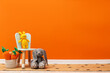 © New Africa - Child's chair and toys near orange wall in room. Space for text