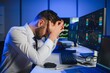 © Serhii - Intraday trader angry over loss in stock market investment while trading. risk of investing in cryptocurrency