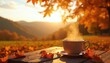 © Vadym - Steaming cup of tea on a wooden table, autumn leaves, golden sunset light over hills. Peaceful outdoor fall scene, warm beverage, seasonal comfort, drink.